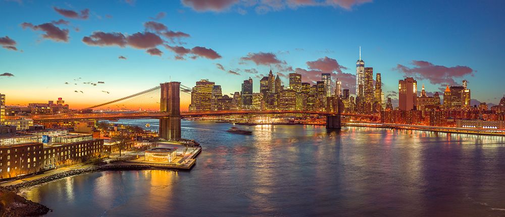 Evening view of Lower Manhattan skyline with Brooklyn bridge over East river, New York art print by Assaf Frank for $57.95 CAD