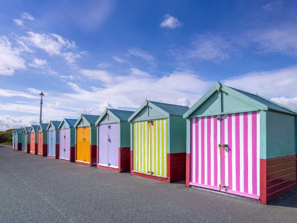 Colorful beach huts in a row art print by Assaf Frank for $57.95 CAD
