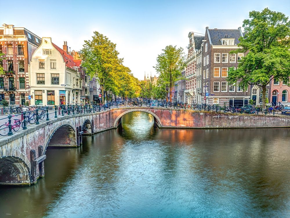 Canal through Amsterdam city art print by Assaf Frank for $57.95 CAD