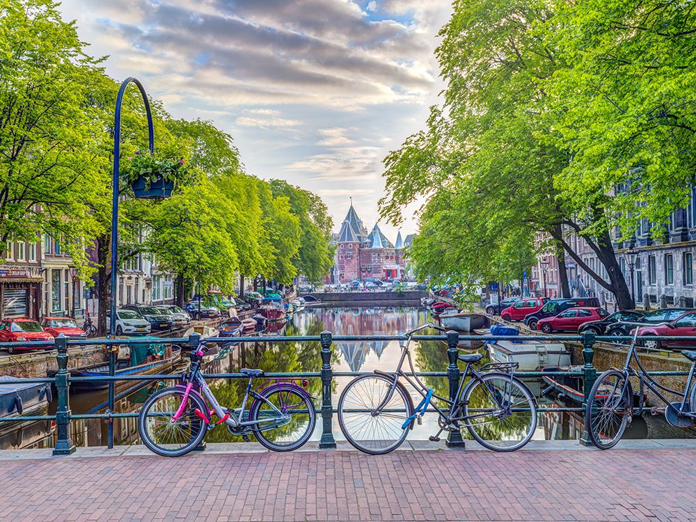 Bicycles parked along the canal, Amsterdam art print by Assaf Frank for $57.95 CAD
