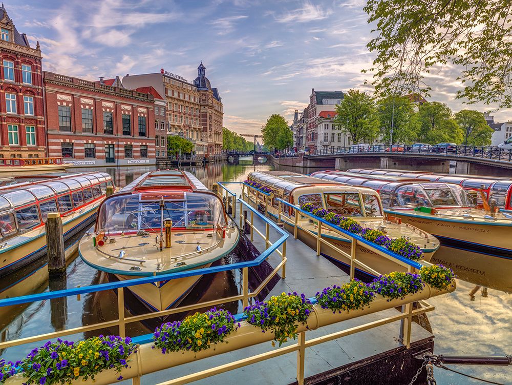 Boats moored in the Canal through Amsterdam city art print by Assaf Frank for $57.95 CAD
