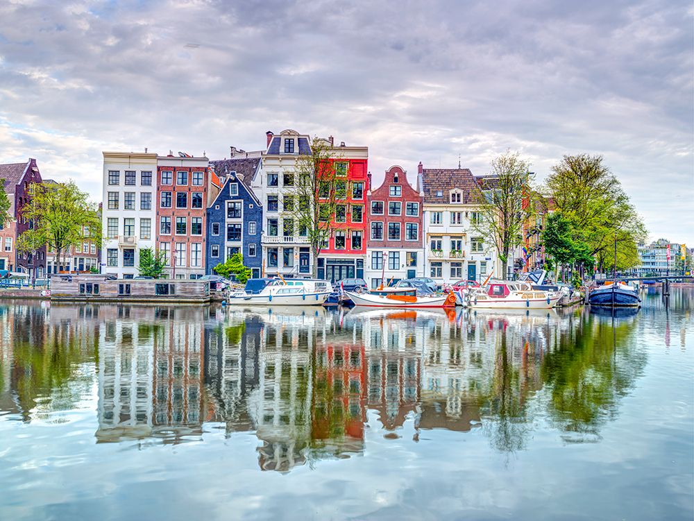 Amsterdam townhouses by the canal art print by Assaf Frank for $57.95 CAD