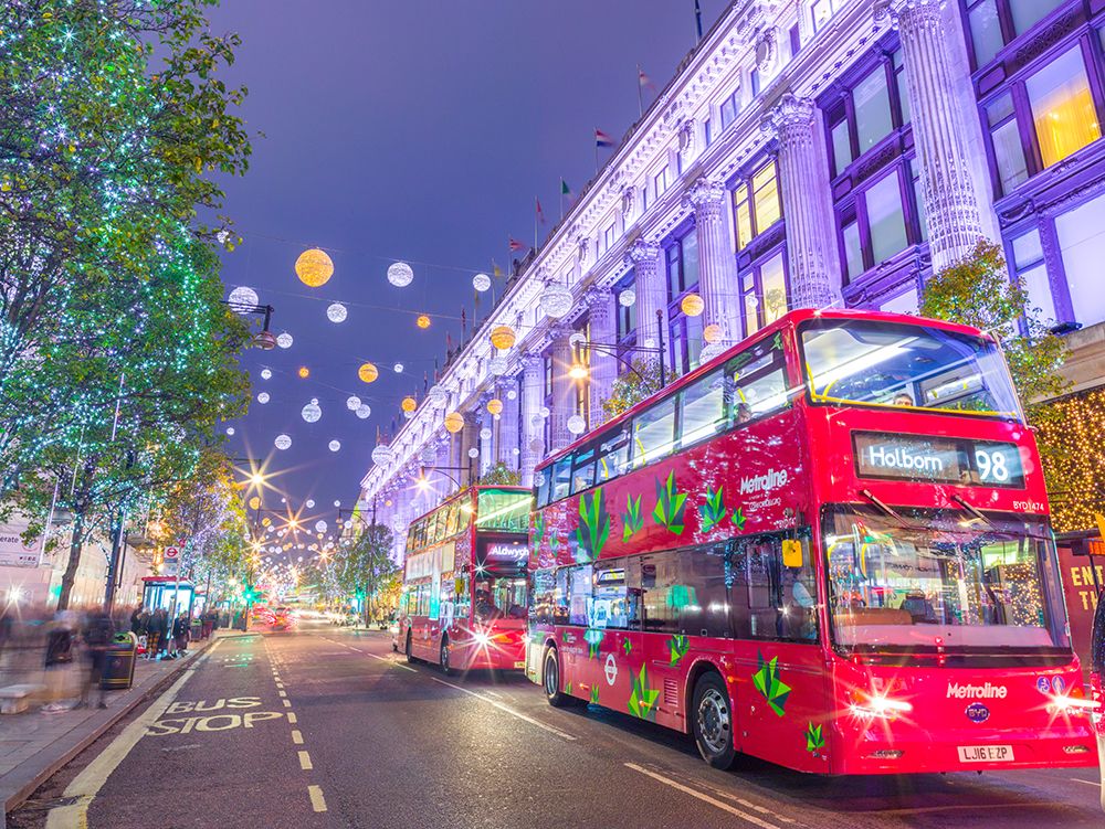 London street decorated with Christmas lights art print by Assaf Frank for $57.95 CAD