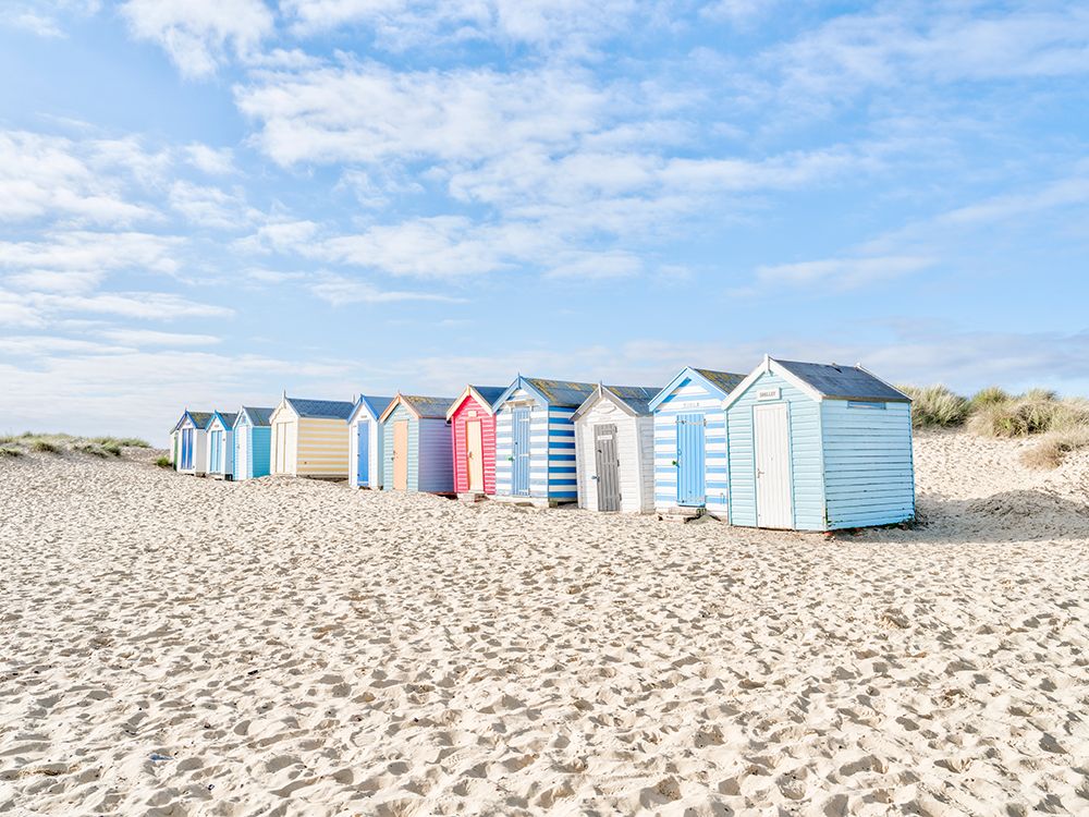 Beach huts on sandy seashore art print by Assaf Frank for $57.95 CAD