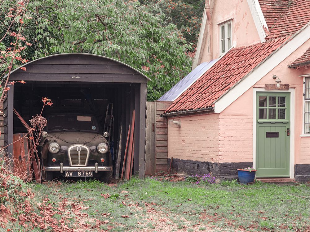 Classic car in garage of old house art print by Assaf Frank for $57.95 CAD