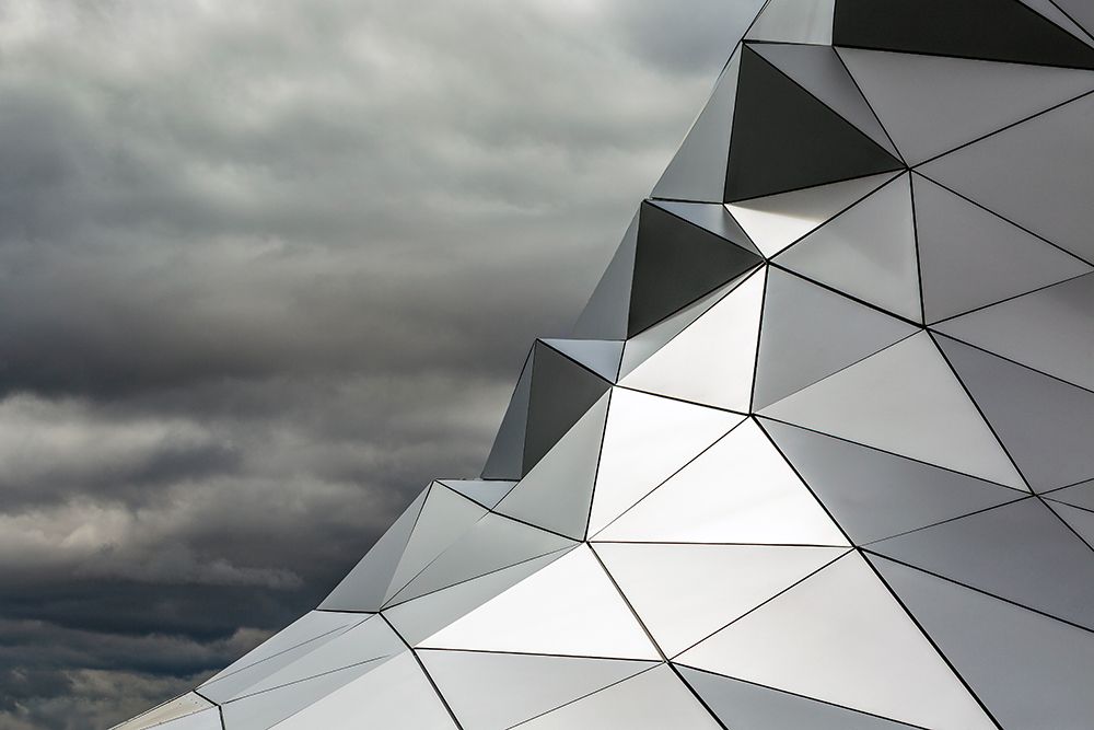 Geometric Metal Structure With Sharp Angles Against A Cloudy Sky. Lyon, France art print by Michael Interisano for $57.95 CAD