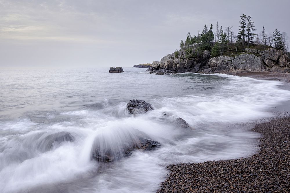 A Rocky Coastline With Waves Crashing And Trees On The Cliff. Thunder Bay, Ontario, Canada art print by Susan Dykstra for $57.95 CAD