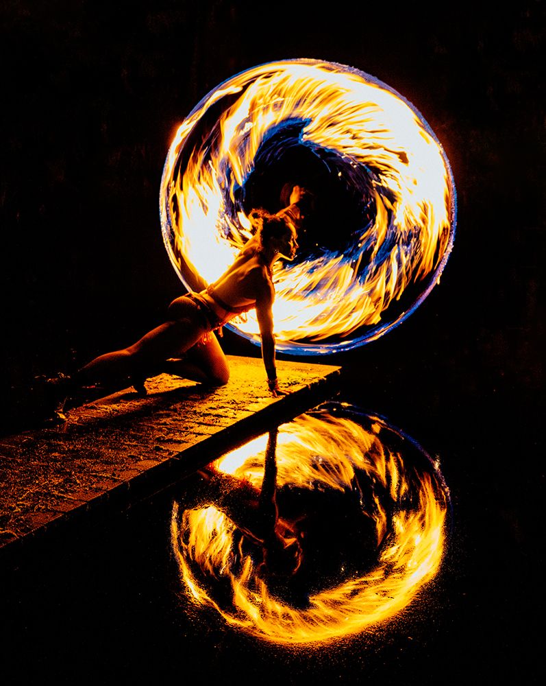 Fire Dancer Performing With A Fire Hoop At Night, Reflecting On Water. Wa, USA art print by Pete Saloutos for $57.95 CAD