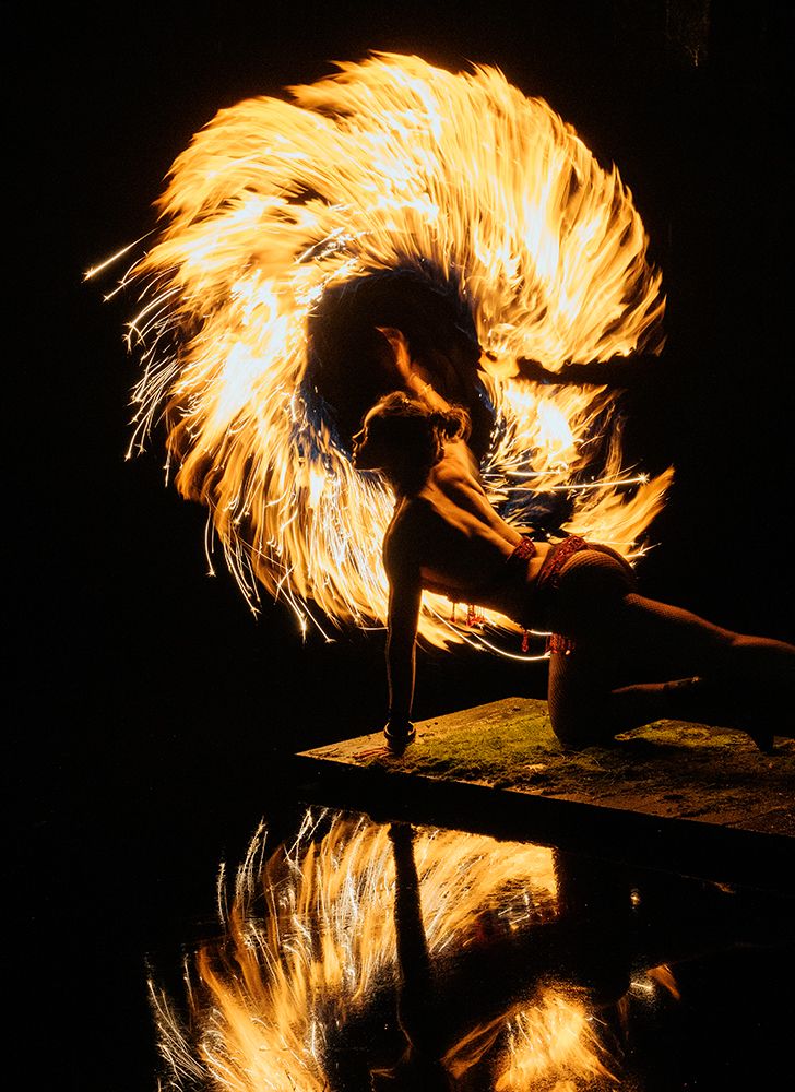 Performer Spins Fire Poi, Creating Vibrant Light Trails Against A Dark Background. Wa, USA art print by Pete Saloutos for $57.95 CAD