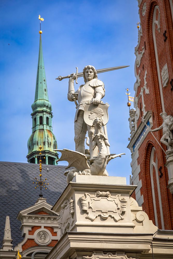Europe, Latvia, Riga. St. Peters Lutheran Church, Foreground St. Michael Slaying The Dragon art print by Philippe Turpin for $57.95 CAD