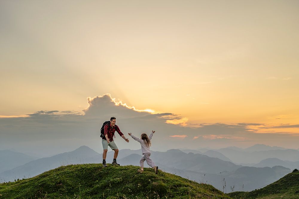 Father Enjoying And Playing With Daughter On Mountain At Sunrise Under Clear Sky art print by Daniel Ingold for $57.95 CAD