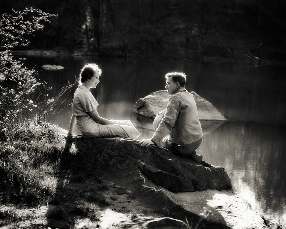 1930S Romantic Couple Sitting On Boulder Beside Lake art print by H. Armstrong Roberts for $57.95 CAD