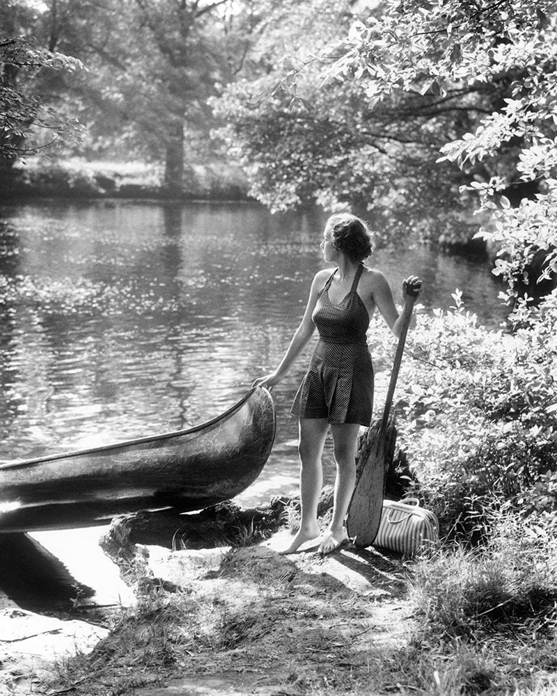 1930S Young Woman Wearing Bathing Costume Shorts Halter Top Barefoot Hand On Front Of Canoe Lake art print by H. Armstrong Roberts for $57.95 CAD