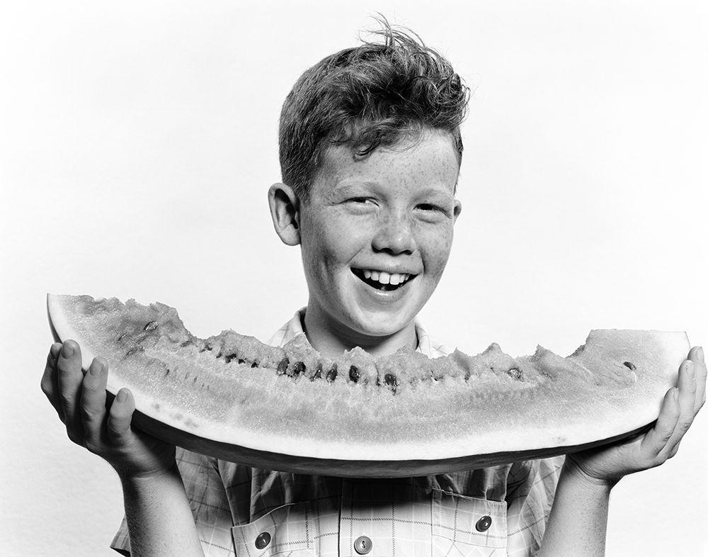 1940S 1950S Smiling Boy Holding Eating Large Slice Of Watermelon art print by ClassicStock for $57.95 CAD