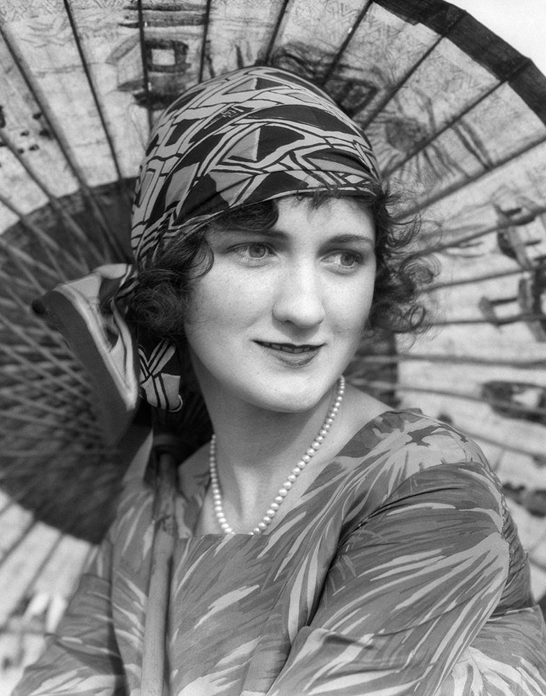 1920S Portrait Of A Woman In Front Of A Japanese Parasol Wearing Pearls And A Silk Print Headband art print by ClassicStock for $57.95 CAD