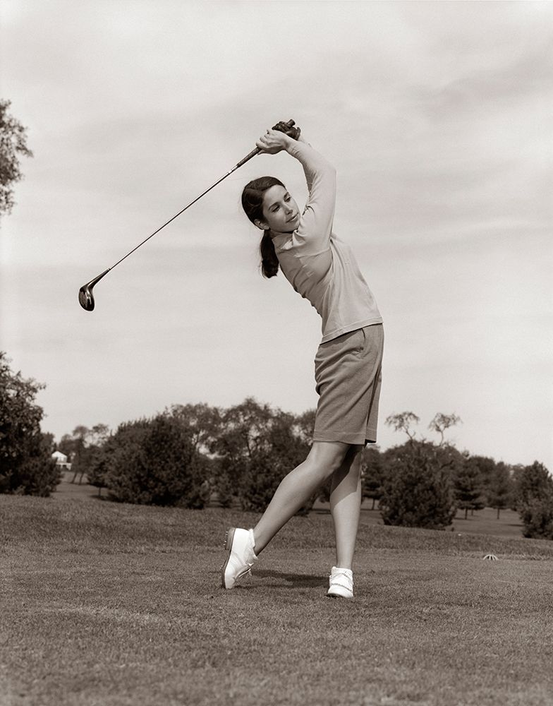 1960S Woman Playing Golf Teeing Off Golf Ball From Tee With Driver Summer Outdoor art print by ClassicStock for $57.95 CAD