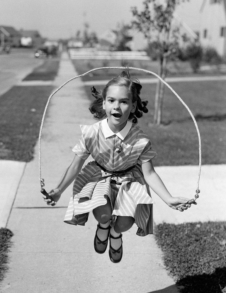 1950S Girl Jumping Rope On Sidewalk art print by ClassicStock for $57.95 CAD