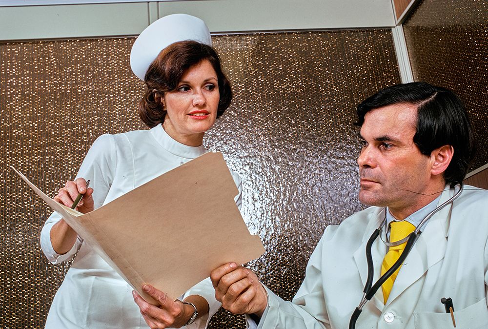 Vintage Photograph. Medical Professionals Collaborating On Patient Care Strategy. art print by ClassicStock for $57.95 CAD