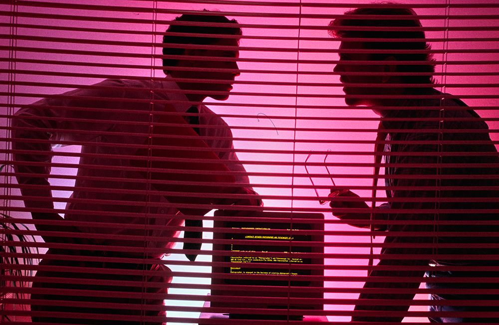 Silhouetted Tech Discussion Behind Office Blinds, Computer Programming Concept, Vintage Photograph art print by ClassicStock for $57.95 CAD