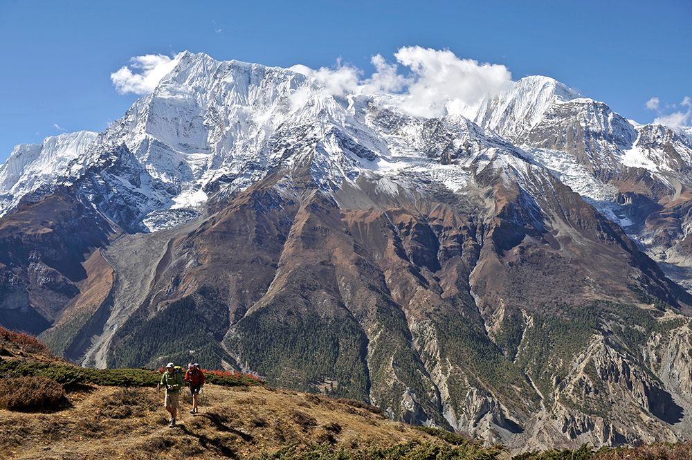 Couple Trekking The Annapurna Circuit In Nepal. art print by HagePhoto for $57.95 CAD