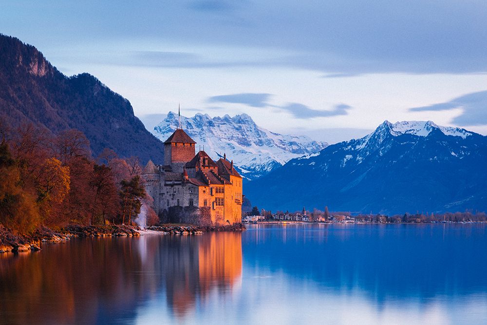 Switzerland Chillon Castle In The Evening With Alps On A Background art print by Evgeny Vasenev for $57.95 CAD