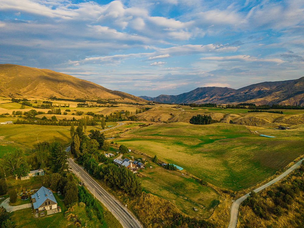 Drone Shot Of Valley In Queenstown New Zealand art print by Alex Lustig for $57.95 CAD