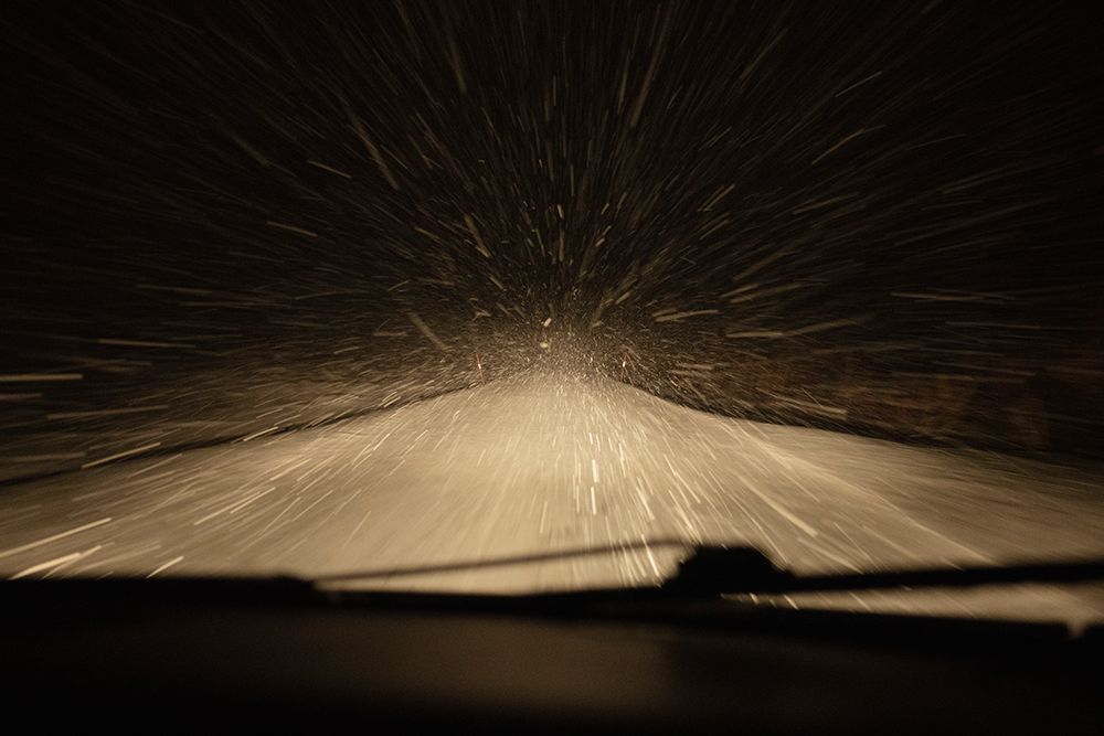 Night Driving Through Winter Snow Storm, Lofoten Islands, Norway art print by Cody Duncan for $57.95 CAD