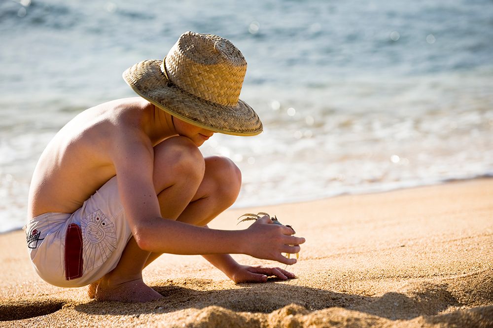 Young Boy On The Beach Of Haena, Kauai. art print by Kevin Steele for $57.95 CAD