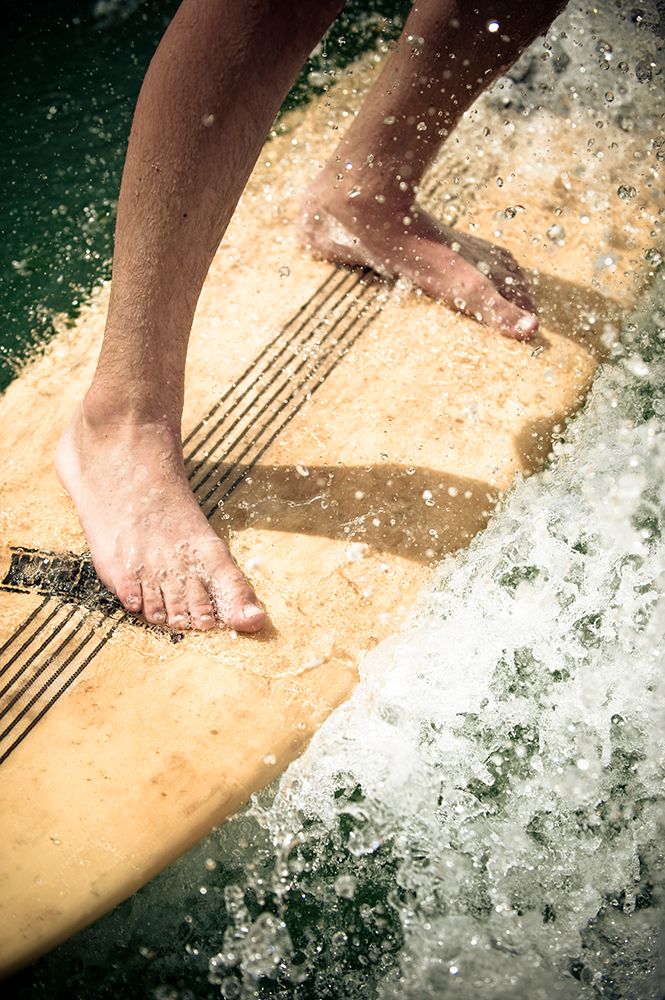 Very Close Shot Of Bare Feet In Action On A Surfboard. art print by Kevin Steele for $57.95 CAD