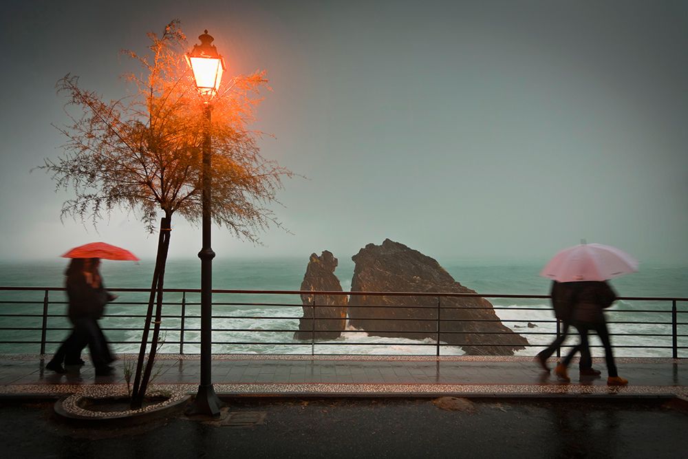 Two Couples Walking In The Rain, Monterosso Al Mare, Liguria, Italy. art print by Andrew Peacock for $57.95 CAD