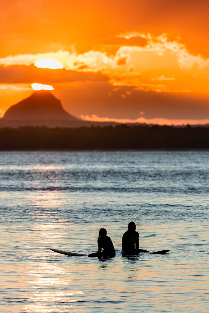 Two Surfers Wait For A Wave At Sunset. art print by Andrew Peacock for $57.95 CAD