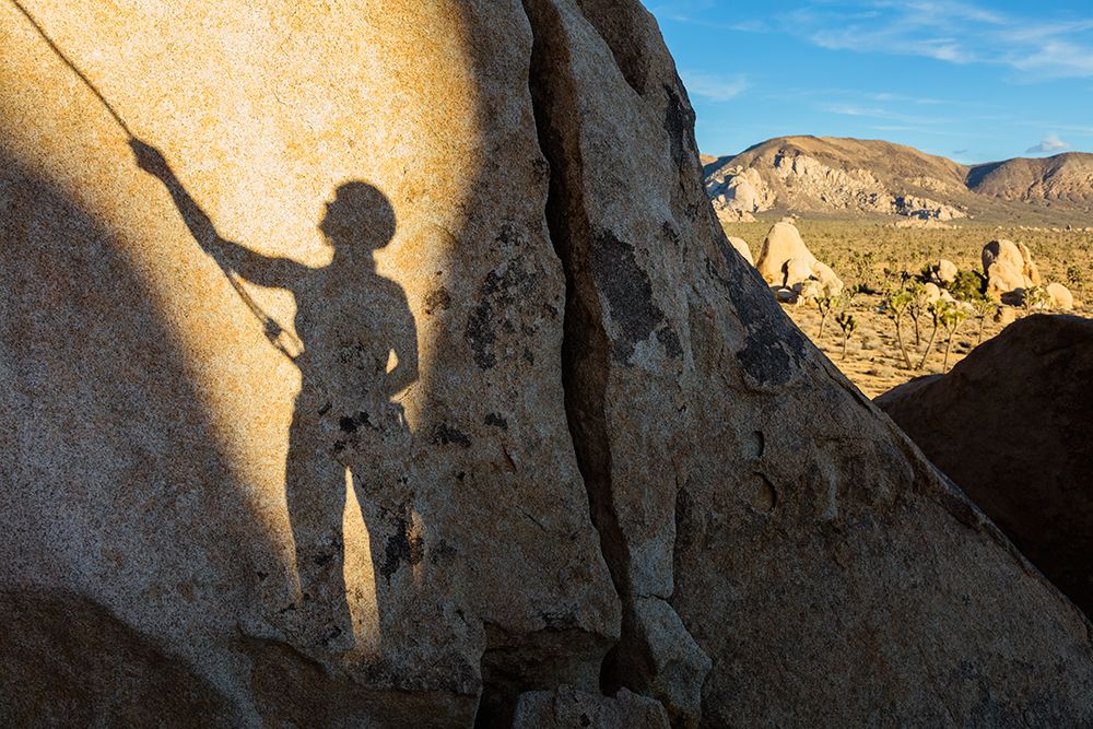 A Shadow Of A Climber Falls On A Rockface. art print by Andrew Peacock for $57.95 CAD