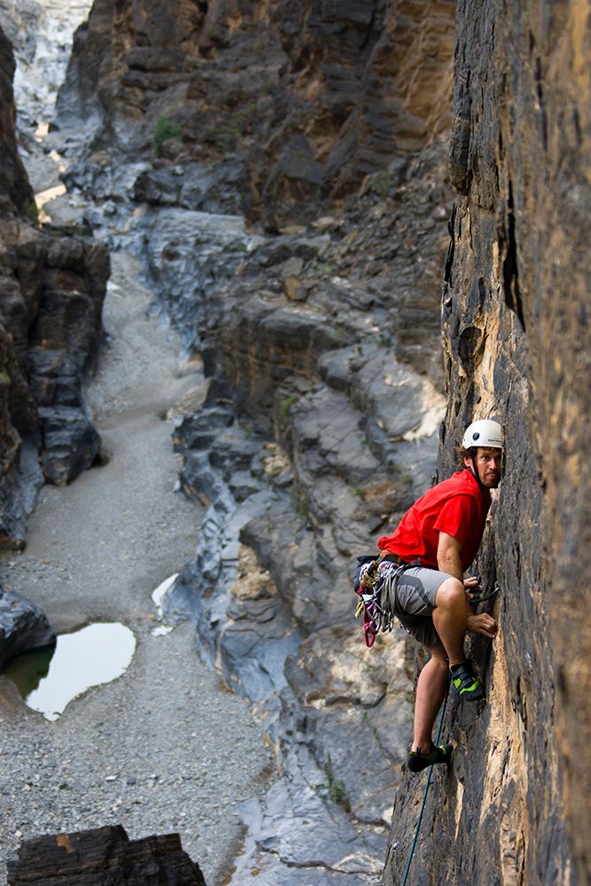 Male Rock Climbing In Canyon. art print by Gabe Rogel for $57.95 CAD