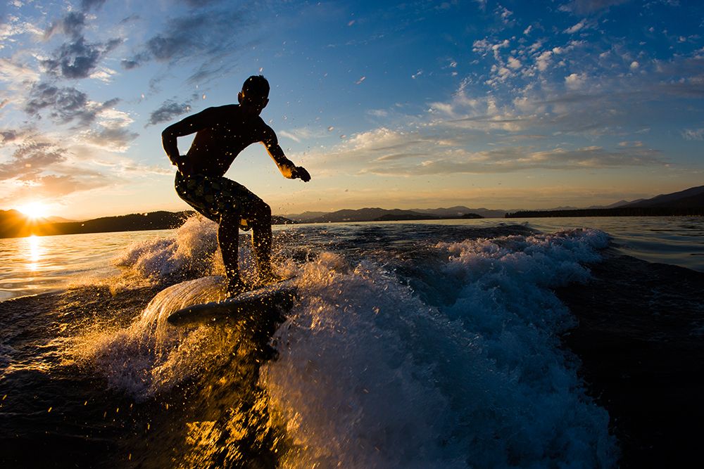 Man Surfing At Dusk On Lake. art print by Gabe Rogel for $57.95 CAD