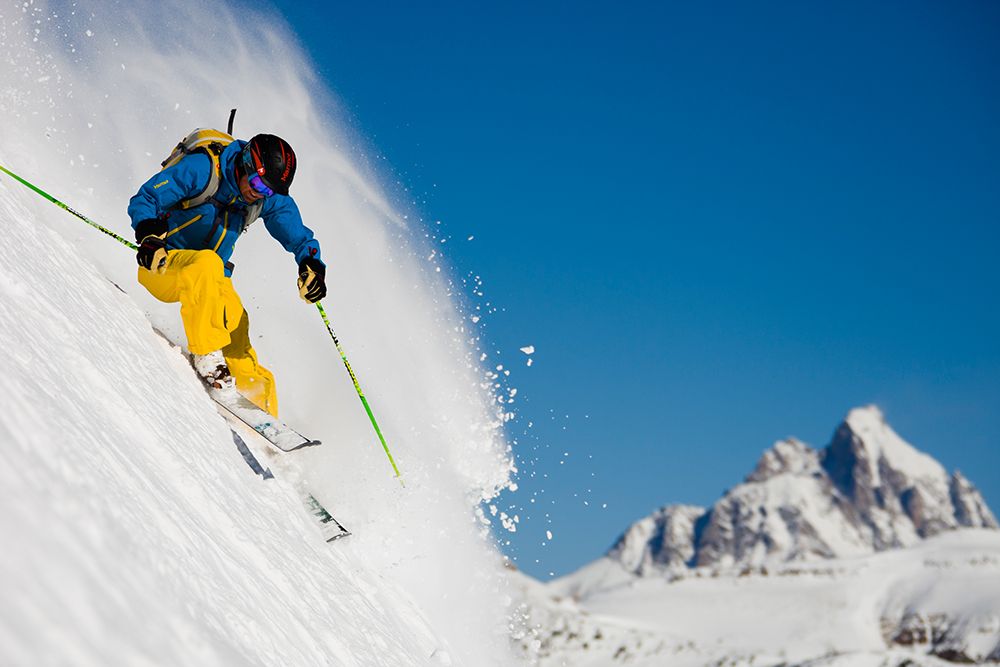 Man Skiing Down Steep Slope In Mountains. art print by Gabe Rogel for $57.95 CAD