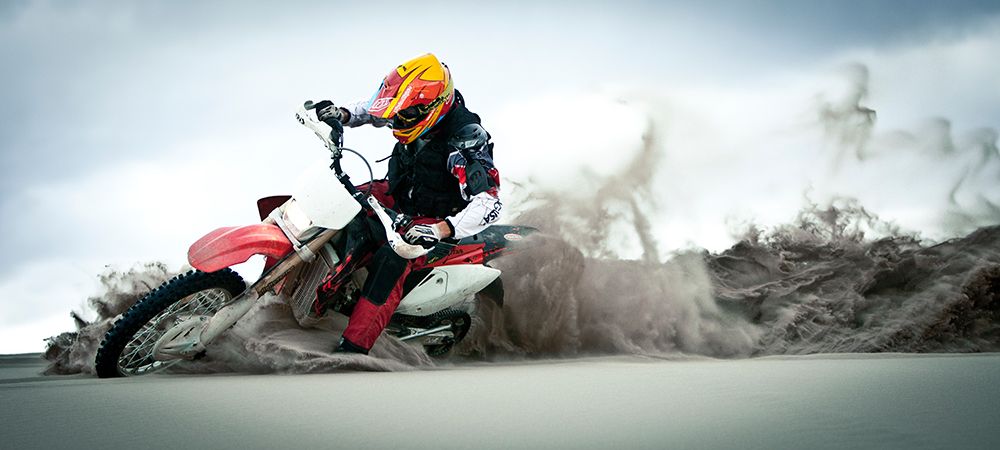 Man Riding Dirt Bike In Sand Dunes. art print by Gabe Rogel for $57.95 CAD