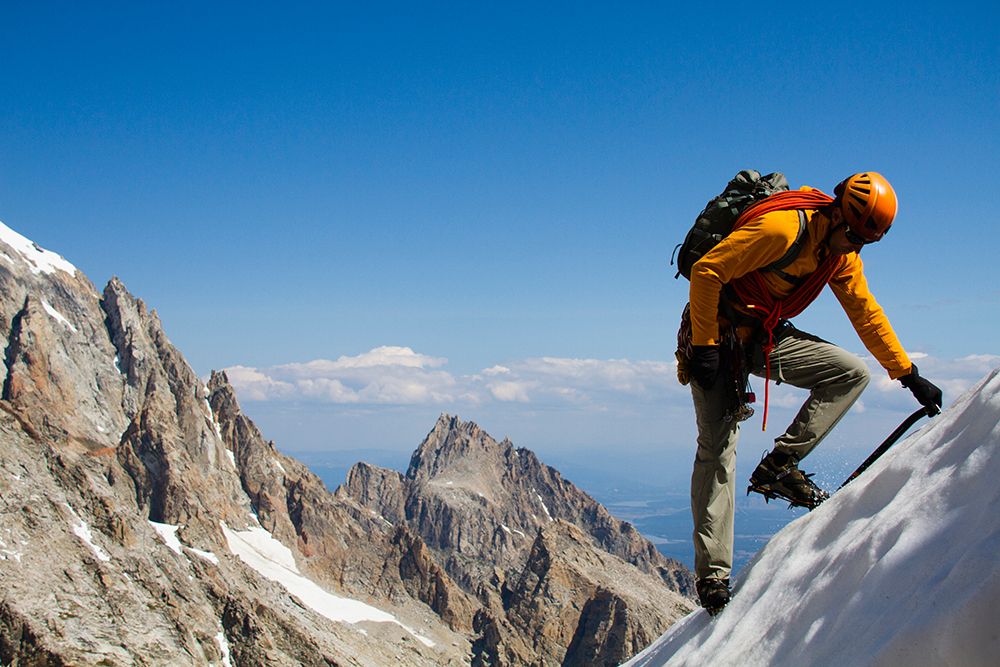 Man Mountaineering Climbing Up Snow With Crampons. art print by Gabe Rogel for $57.95 CAD