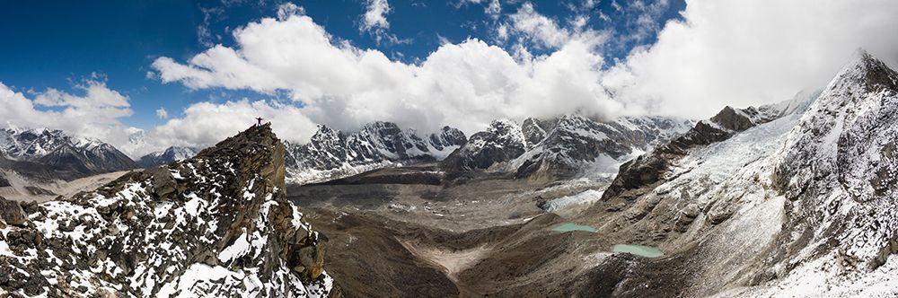 Trekker Stands High On Ridge Below Kala Patthar In Sweeping Panorama Of Peaks, Khumbu Himalaya. art print by Ethan Welty for $57.95 CAD