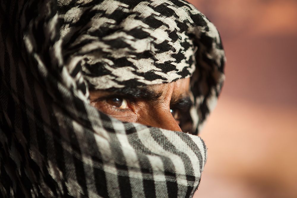 A Bedouin Man Wearing A Keffiyeh In Wadi Rum, Jordan. art print by Ethan Welty for $57.95 CAD