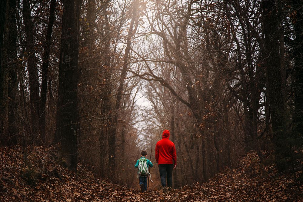 Father Son Walking Through Forest In Winter art print by Kristen Ryan for $57.95 CAD