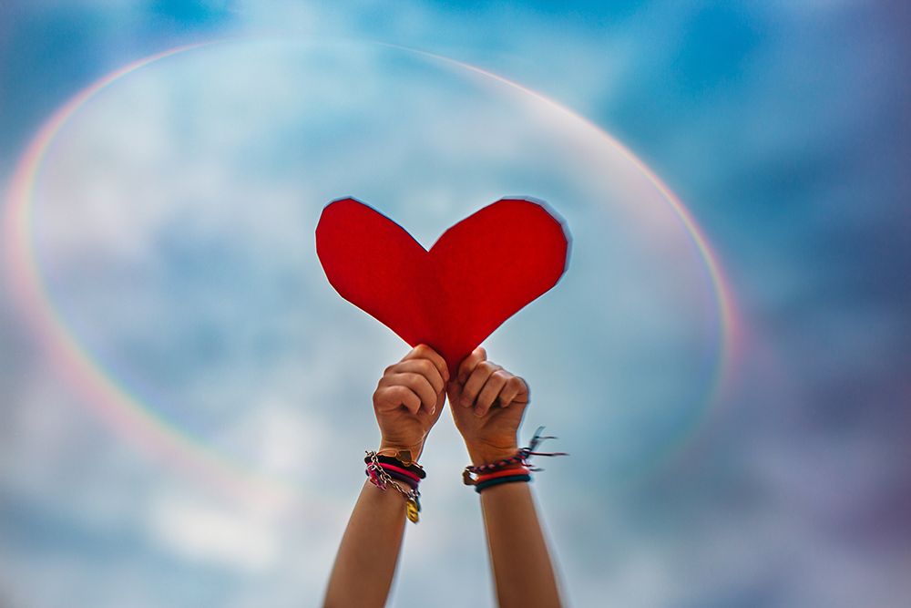 Hands Holding Red Heart In Sky With Rainbow Background art print by Kristen Ryan for $57.95 CAD