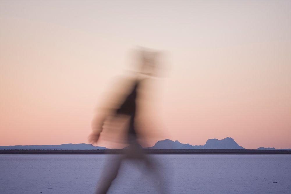 A Young Man Walks Across The Natural Salt Flats On Laguna San Ignacio, Baja California, Mexico. art print by Ethan Welty for $57.95 CAD