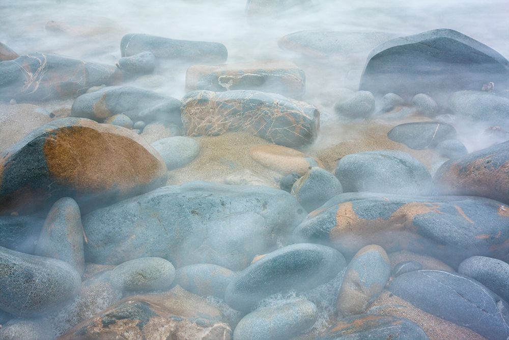 Waves Swirl Over Colorful Rounded Rocks On The Rocky Shore Of Pescadero State Beach, California. art print by Ethan Welty for $57.95 CAD