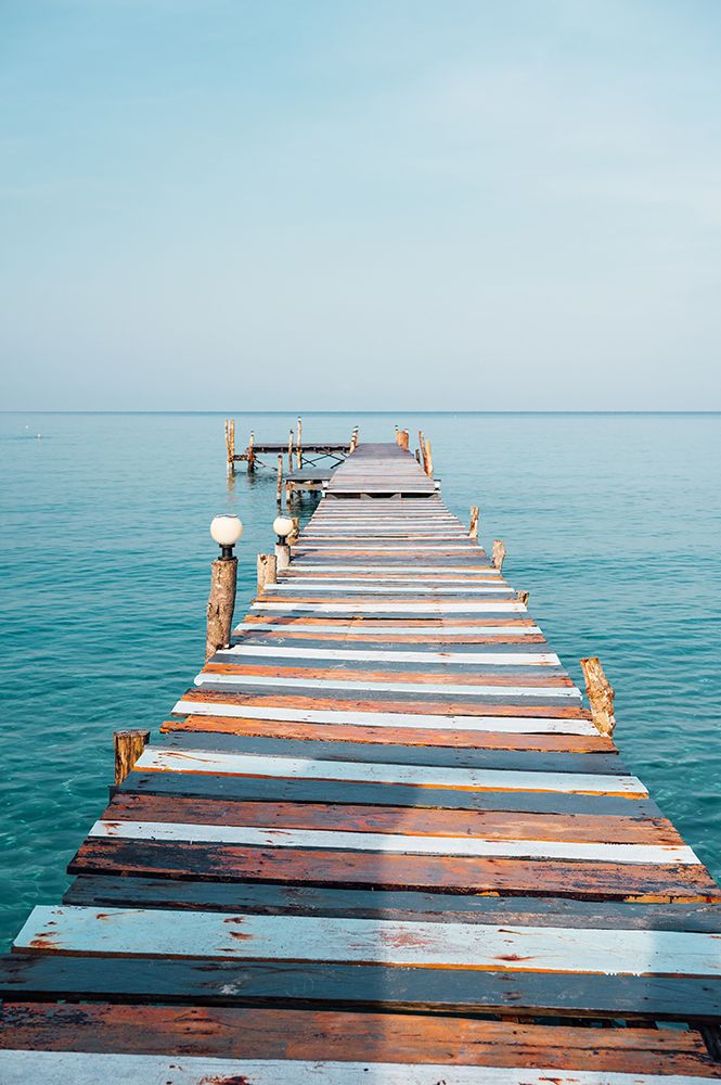 Wooden Pier Over Turquoise Sea At Klong Chao Beach, Koh Kood, Thailand art print by Agita Captures for $57.95 CAD