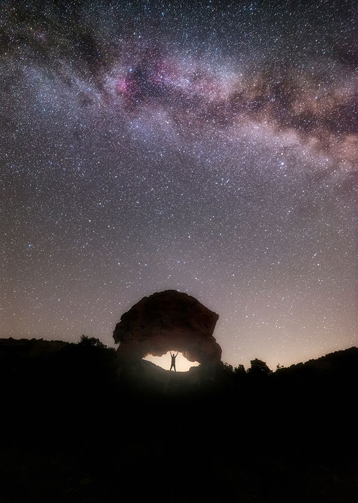 Night Photography Of Silhouette Under Rock Arch With Milky Way art print by Hector Hernandez for $57.95 CAD