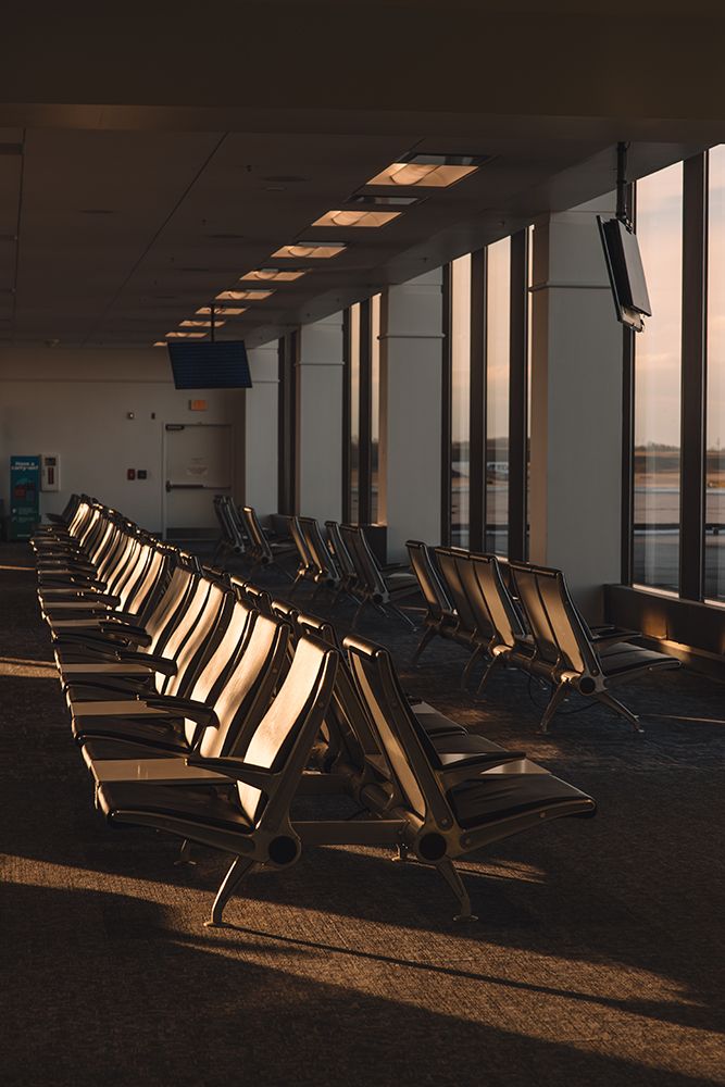 Sunlight Streams Through A Quiet Airport Terminal art print by Kristin Henderson for $57.95 CAD