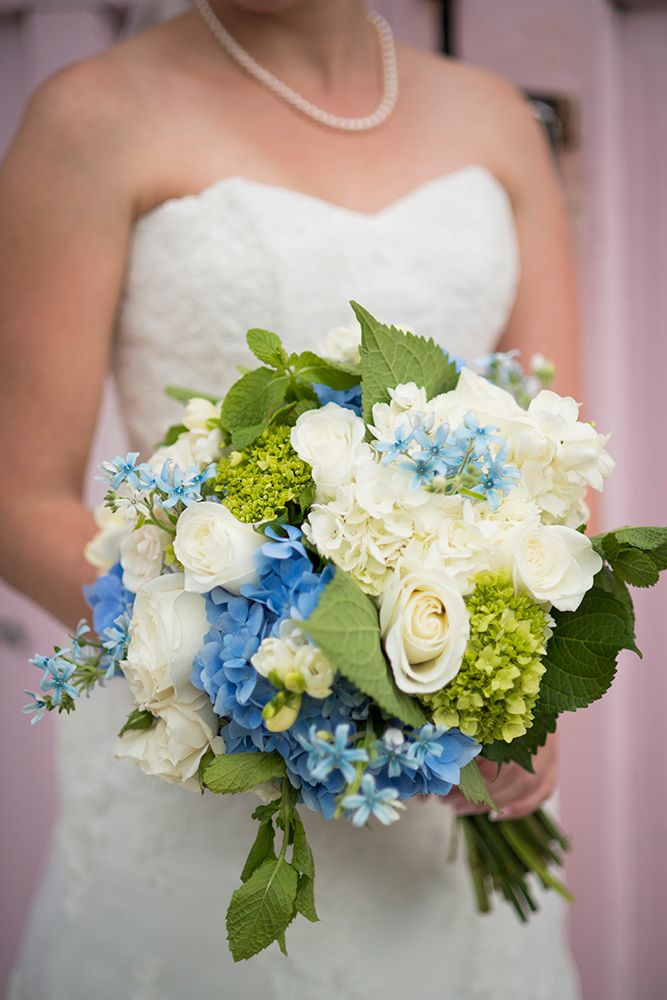 Bride Holding White And Blue Wedding Bouquet art print by Mariah Ashley for $57.95 CAD