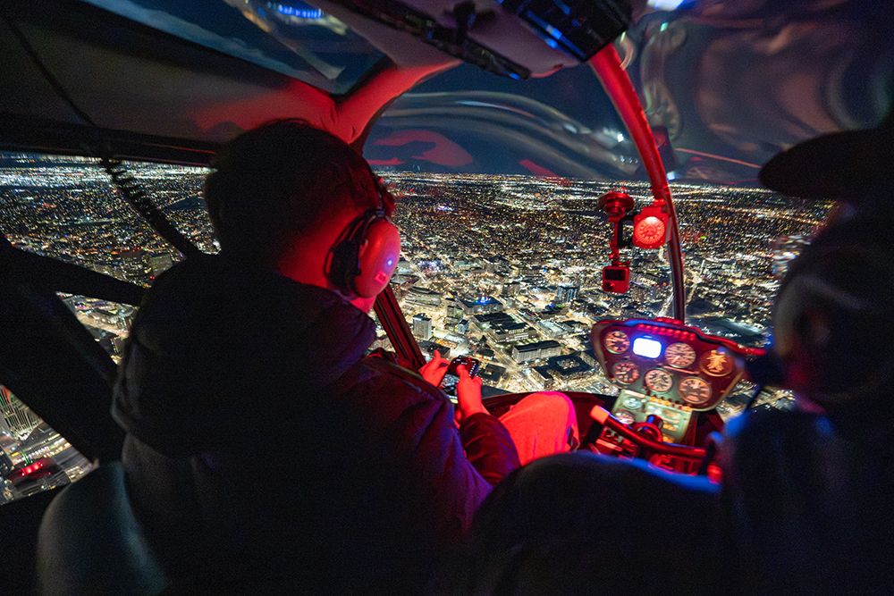 Experience The Thrill Of Nighttime Cityscapes: Helicopter Pilot Navigates Over Vibrant Urban Lights art print by Max Seigal for $57.95 CAD