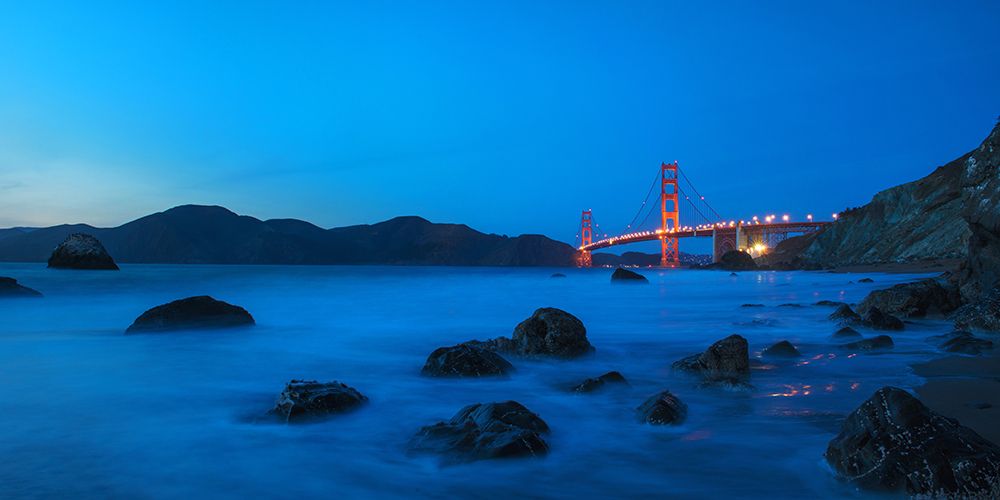 Explore The Majestic Golden Gate Bridge At Dusk - A Stunning San Francisco Bay Icon Illuminated art print by Max Seigal for $57.95 CAD
