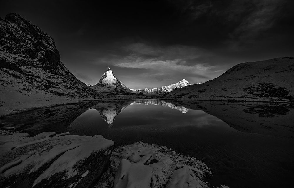 Discovering Tranquility: Stunning Monochrome View Of The Snow-Capped Matterhorn Reflecting art print by Max Seigal for $57.95 CAD